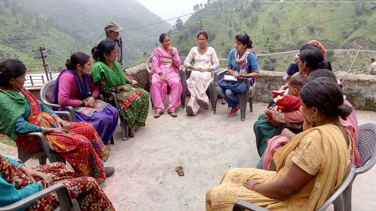Women participating in community development